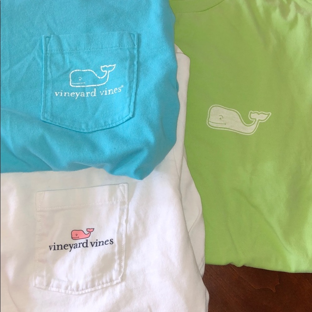 Collection of vineyard vines t shirts.
